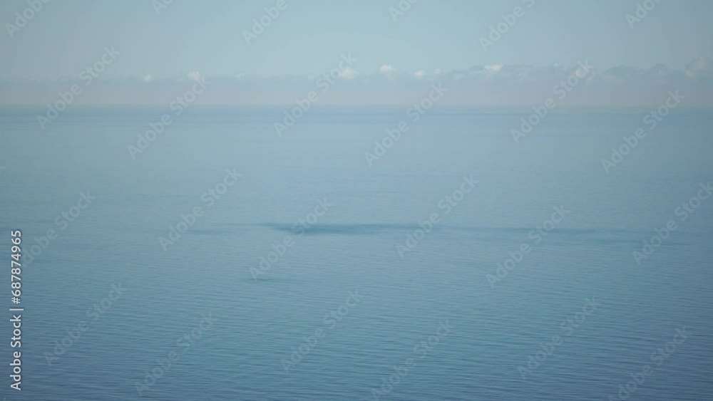 Aerial panoramic view of beautiful sunset above sea. Beautiful seascape. Sun glare, small waves on the water surface. Evening. Horizon. Nobody. No people. Never-ending beauty of nature. Aerial panoramic view of beautiful sunset above sea. Beautiful seascape. Sun glare, small waves on the water surface. Evening. Horizon. Nobody. No people. Never-ending beauty of nature.