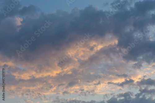 Scenic cumulus clouds on summer evening. Atmosphere background or wallpaper © Elena