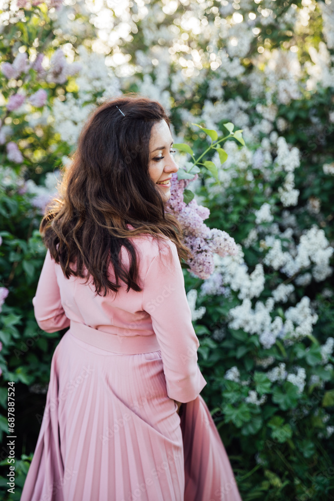 Flowers nature beautiful woman with gray on a walk Flowers nature beautiful woman with gray on a walk