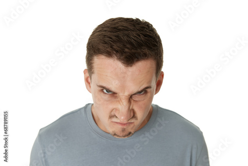 annoyed angry bearded man looking at camera on white studio background