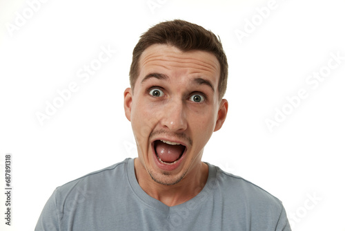 surprised guy looking at camera on white studio background