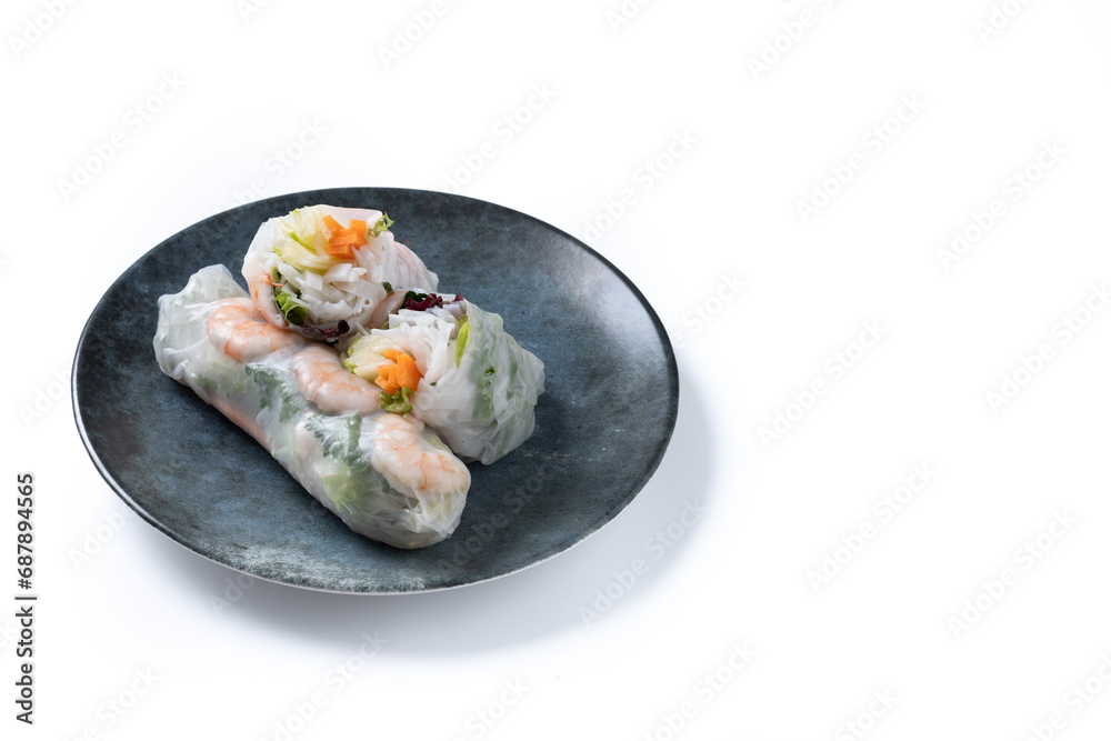 Vietnamese spring rolls with vegetables, rice noodles and prawns isolated on white background. Copy space Vietnamese spring rolls with vegetables, rice noodles and prawns isolated on white background. Copy space