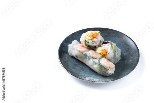 Vietnamese spring rolls with vegetables, rice noodles and prawns isolated on white background. Copy space