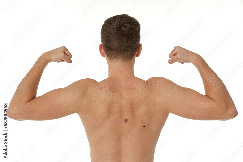 young man showing his bicep over white background. Rear view. perfect body shape young man showing his bicep over white background. Rear view. perfect body shape