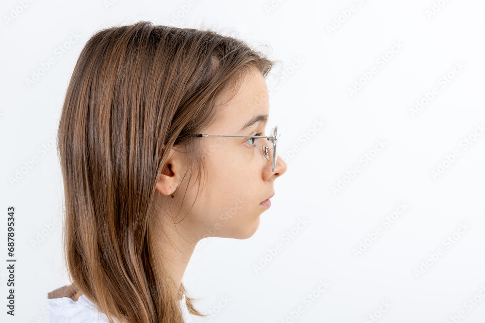 Side view portrait of girl with glasses, isolated on white background. Side view portrait of girl with glasses, isolated on white background.