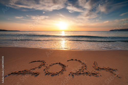 Fototapeta Naklejka Na Ścianę i Meble -  New year 2024 morning over sandy beach, beautiful sea sunrise