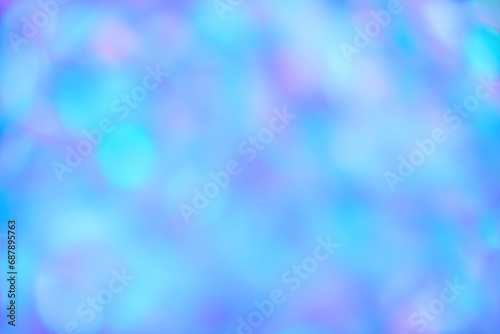 Blurred pastel neon blue mint pink holographic bokeh background texture. Abstract festive glittering Lo-fi retro design Smooth holographic iridescent colors . Festive optimistic pattern