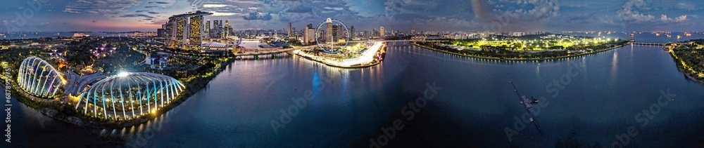 Fototapeta premium Sunset aerial view of Marina Bay and Singapore skyline