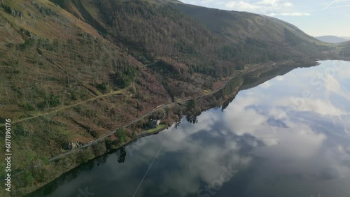 Wallpaper Mural Cloud reflections and lakeside road with castle-like structure on reservoir shore. Thirlmere, English Lake District National Park, Cumbria, UK. Torontodigital.ca