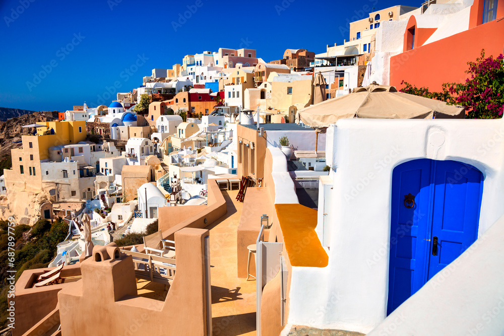 Fototapeta premium Sunny blue sky over residential district in city landscape.
