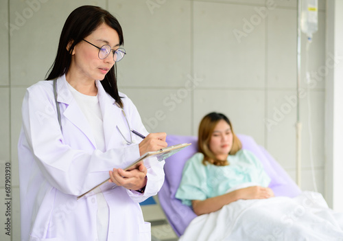 Portrait of young female doctor with patient on background