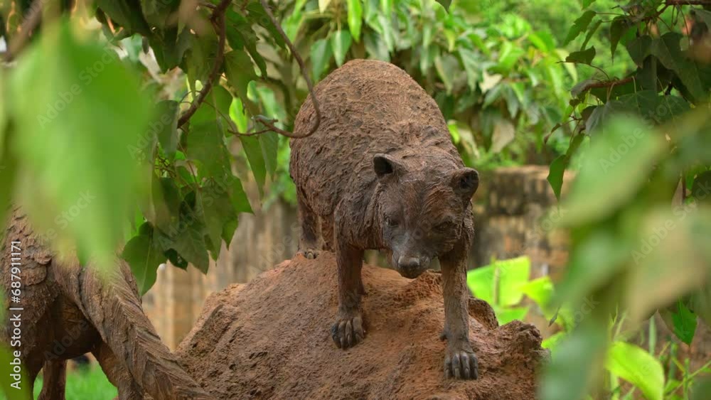 Statue of African civet of Buganda African kingdom culture representing clan, Kampala in Uganda. Static view and focus in background