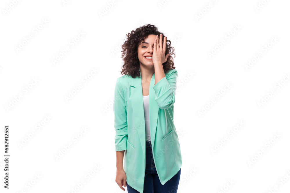 portrait of a young successful brunette employee of a business company woman dressed in an office blue jacket portrait of a young successful brunette employee of a business company woman dressed in an office blue jacket