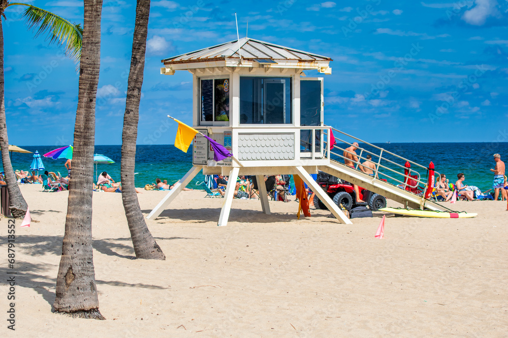 Fort Lauderdale, FL - February 29, 2016: Tourists relaxing on a beach in winter