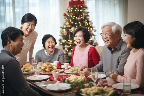 Asian family of 70 year old grand parents, 40 year old parents having a Christmas lunch in daylight, with a beautifully decorated living room with bright soft natural light coming from the windows