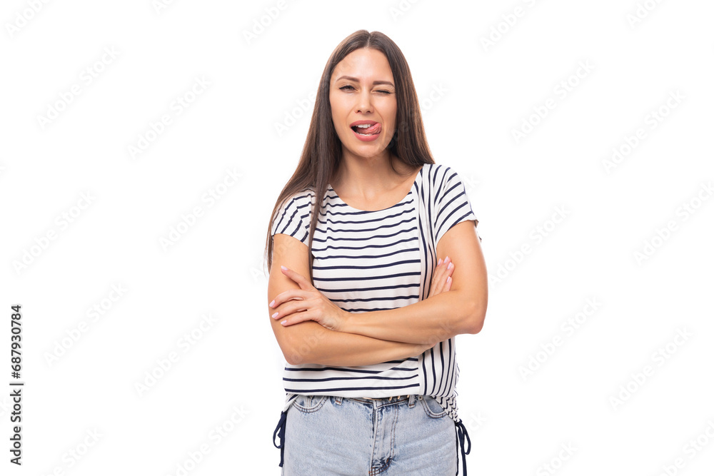 young positive brunette lady with straight hair in glasses is wearing a striped t-shirt smiling on a white background with copy space young positive brunette lady with straight hair in glasses is wearing a striped t-shirt smiling on a white background with copy space