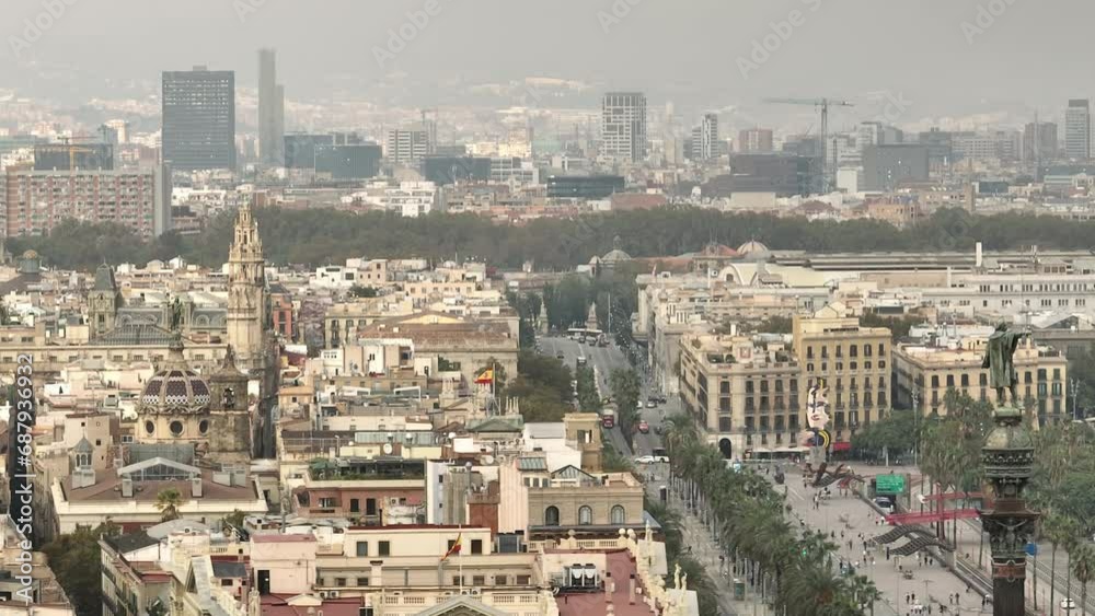 day time flight over barcelona city traffic street famous christopher columbus monument top aerial panorama 4k spain day time flight over barcelona city traffic street famous christopher columbus monument top aerial panorama 4k spain