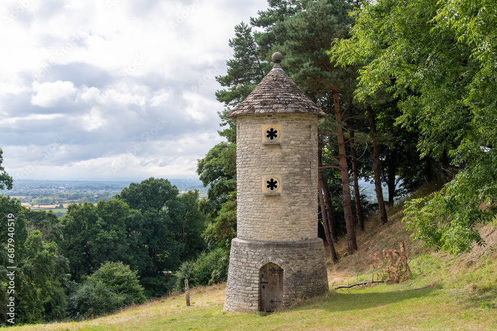 View of a brick bird tower or wildlife tower that provides a nesting place for swallows and barn owls near Horton, Bristol, UK along the public footpath of Cotswold Way