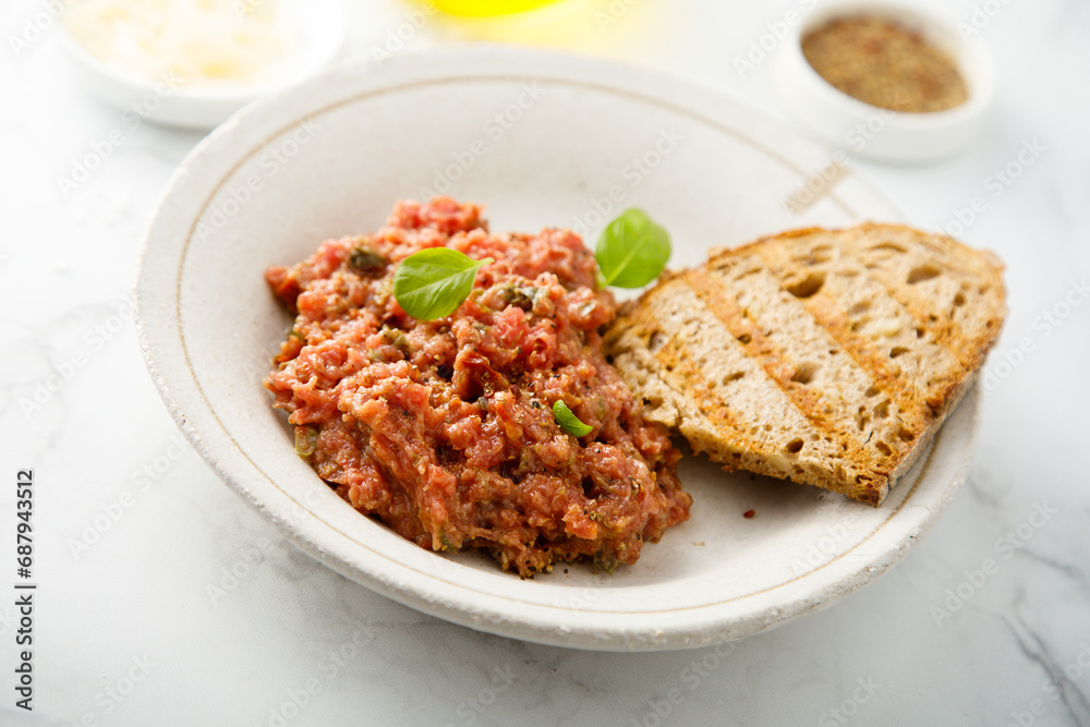 Traditional steak tartare with capers Traditional steak tartare with capers