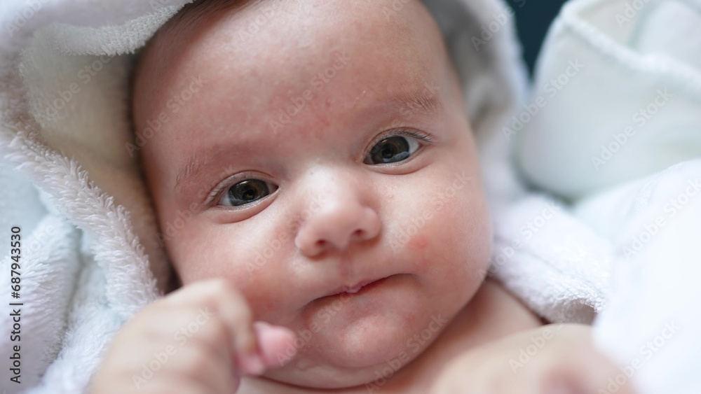 infant girl a newborn sucking thumb. happy family kid dream concept. close up cute newborn baby wrapped lifestyle in bath towel at home indoors. daughter a small child sucks his thumb after bathing infant girl a newborn sucking thumb. happy family kid dream concept. close up cute newborn baby wrapped lifestyle in bath towel at home indoors. daughter a small child sucks his thumb after bathing