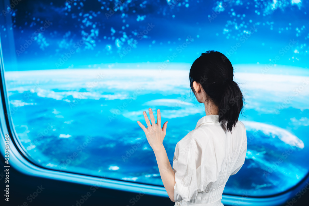 宇宙旅行を楽しむ若い女性