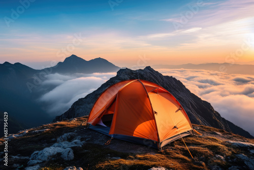 A tent pitched on top of a mountain. Perfect for adventure and camping themes
