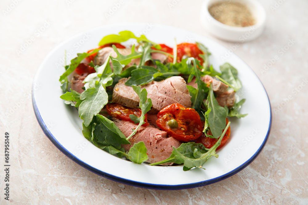 Arugula salad with roast beef and tomatoes Arugula salad with roast beef and tomatoes