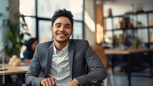 Businessman in a wheelchair in the office photo