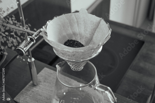 Hand drip coffee extraction process in kitchen