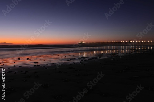 Picturesque view of the Oceanside Pier in California  illuminated by a stunning sunset