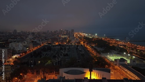 evening time illumination barcelona city famous poblenou cemetery aerial panorama 4k spain photo