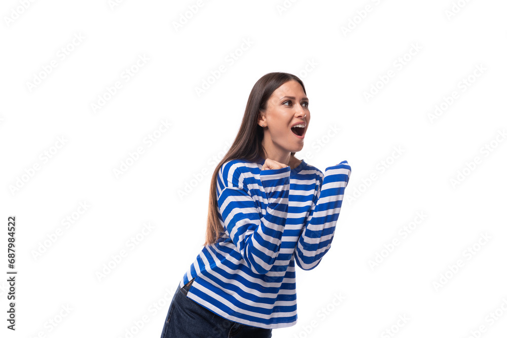 young cute slender brunette lady with straight hair is dressed in a blue striped sailor jacket young cute slender brunette lady with straight hair is dressed in a blue striped sailor jacket