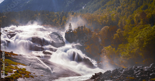 Fototapeta Naklejka Na Ścianę i Meble -  Tveitafossen, a waterfall in Husedalen in Ullensvang municipality in Vestland.