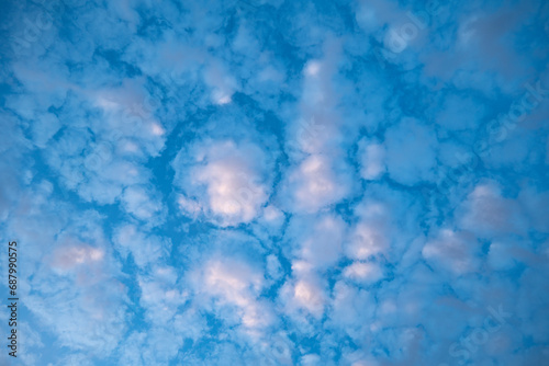 Obraz na płótnie Abstract White, Blue and Purple Alto Cumulus Clouds in the Sky at Dusk w salonie
