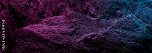 Wallpaper Mural Black stone texture in pink blue neon lighting, dark abstract background. Natural mineral rock close up details, empty backdrop with copy space for design Torontodigital.ca