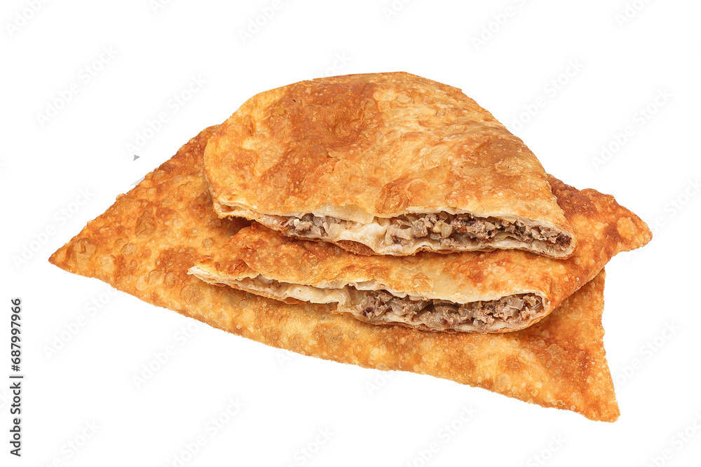 pie fried in oil, cheburek with meat, cut isolated background on a white background