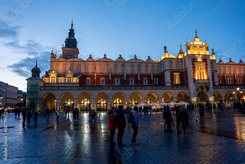 Krakow Old Town City Center at night with illuminated lights photo