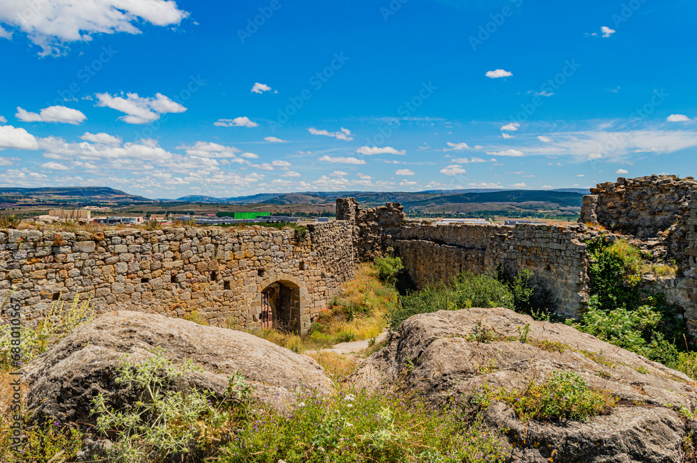 Fototapeta premium medieval castle ruins in the countryside with blue sky
