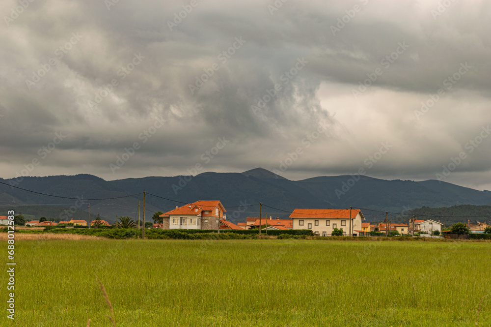 countryside landscape with cloudy sky