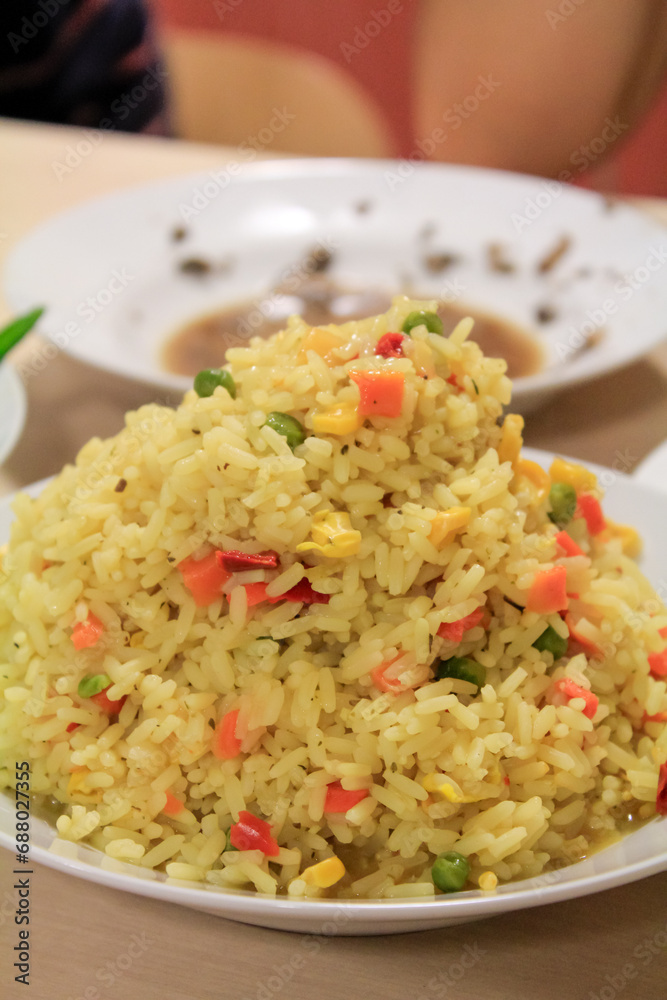 Chinese fried rice in the dish. Chinese food. Food concept.