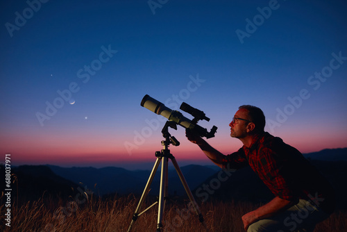 Astronomer looking at the starry skies and crescent Moon with a telescope.