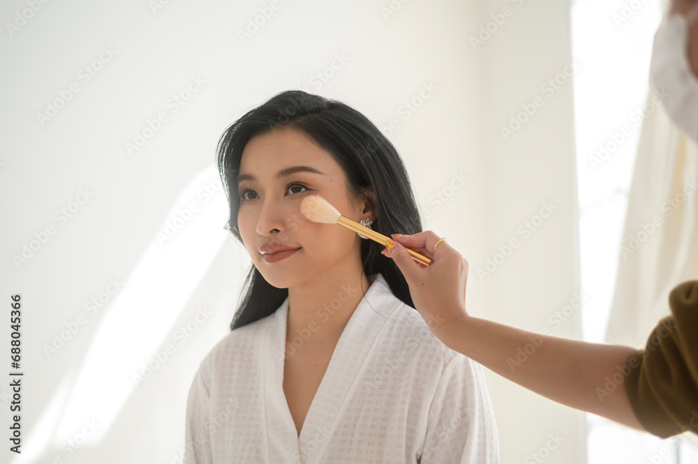 Beautiful bride doing makeup and hairstyle on ceremony wedding day Beautiful bride doing makeup and hairstyle on ceremony wedding day