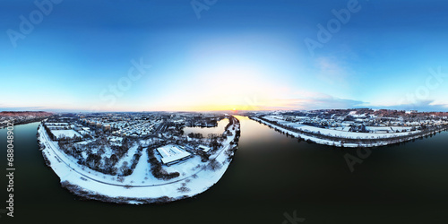 Winter panorama view over the city of Regensburg with sugar-coated houses