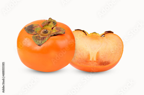 1 and half fresh persimmons on transparent