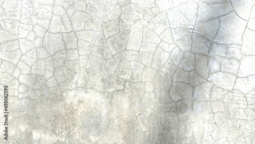Image of cracked cement floors inside a building. © wacharagorn