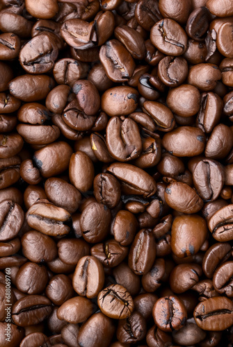 Roasted coffee beans background © Winona