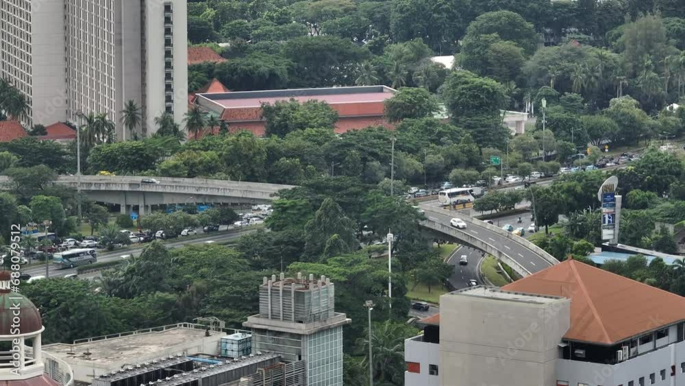 day time jakarta city downtown traffic street road interchange aerial panorama 4k indonesia day time jakarta city downtown traffic street road interchange aerial panorama 4k indonesia