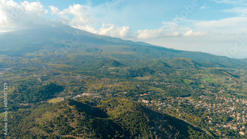 Nicolosi, Sicily, Italy. Volcanic craters overgrown with forest on the slopes of Mount Etna, Aerial View