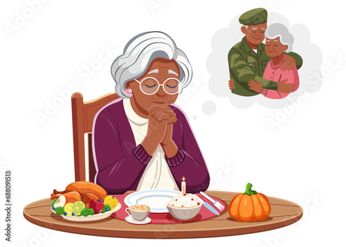 An elderly African American woman sits at the dinner table and celebrates Thanksgiving alone. She thinks and prays for her loved one, her husband, her son, who went to war. Remember with sadness. 