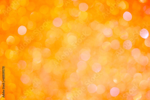 Beautiful orang, yellow, Christmas background, with bokeh. Concept design. Blurred background.